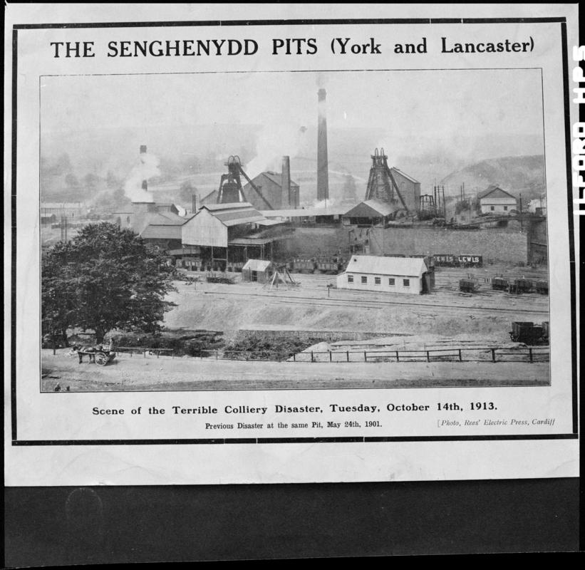 Black and white film negative showing the scene at Universal Colliery Senghenydd after the explosion of 14 October 1913, photographed from a publication.  Caption below photograph reads 'scene of the terrible disaster, Tuesday October 14th 1913.  Previous disaster at the same Pit, May 24th 1901'.  'Senghenydd 2nd disaster' is transcribed from original negative bag.  Appears to be identical to 2009.3/1664.