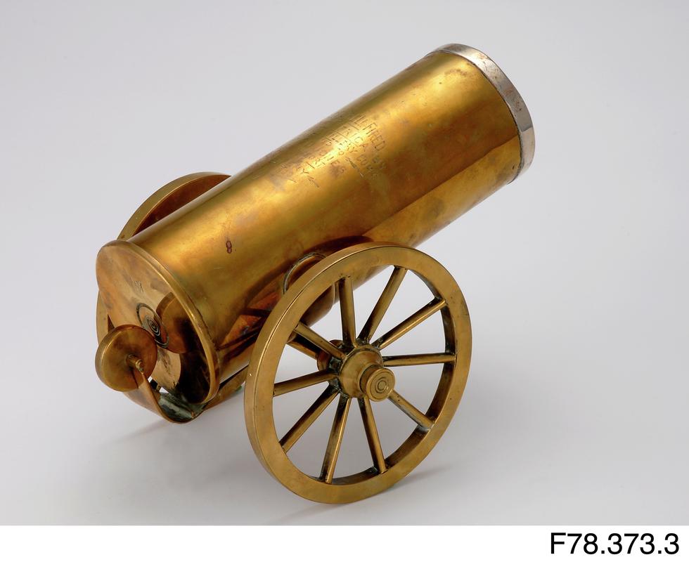 Cannon, brass ornament.