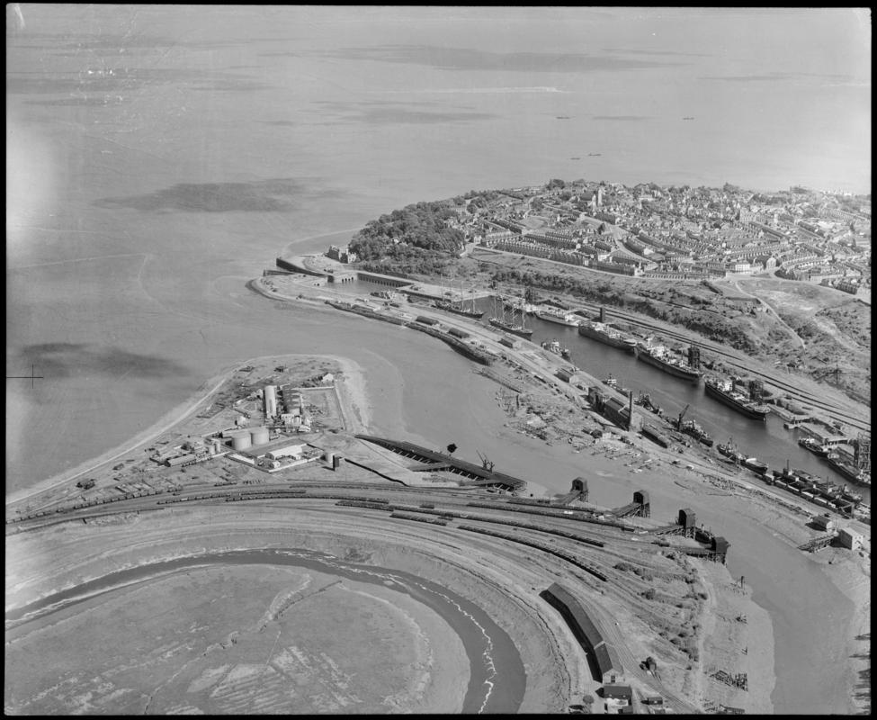 An aerial view of Ely harbour and Penarth Docks showing various vessels including the sailing ships the PASSAT (on the left) and the PAMIR, 1951-2.