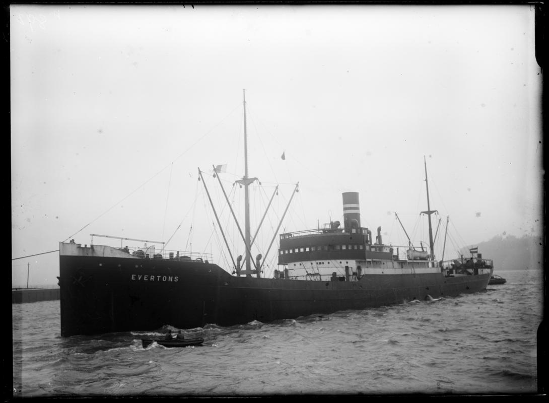 Three quarter Port bow view of S.S. EVERTONS and waterman's boat, Penarth Head, c.1936.
