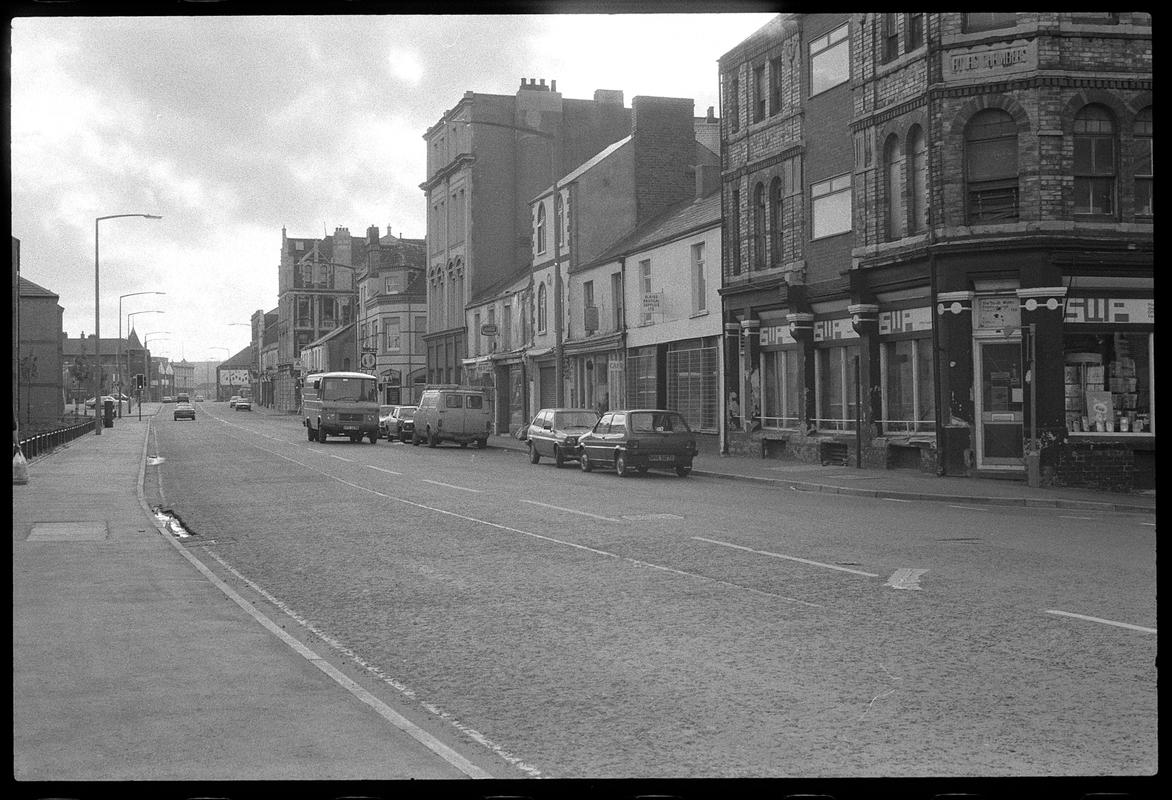 View of James Street, showing Stationers on corner of West Bute Street in foreground.