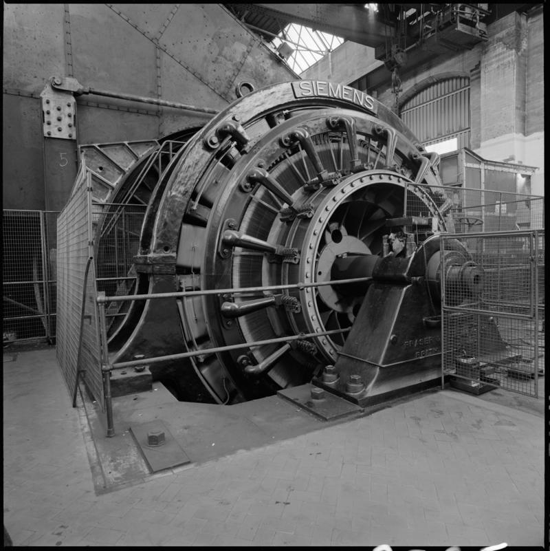 Black and white film negative showing the Siemens Electric winder which was installed at Britannia Colliery in 1910-1914 and worked until the closure of the colliery in 1983.  'Britannia winder' is transcribed from original negative bag.  Appears to be identical to 2009.3/2270 and 2009.3/2271.