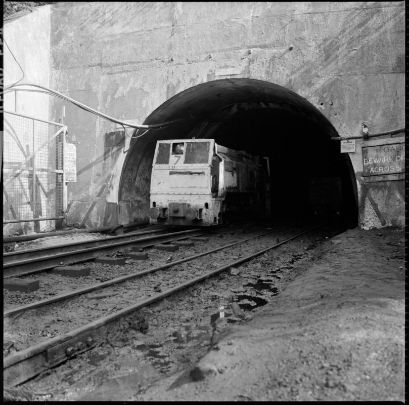 Black and white film negative showing an electric locomotive leaving the mine. 'Blaengwrach' is transcribed from original negative bag.  Similar to 2009.3/2442, 2009.3/2443 and 2009.3/2444.