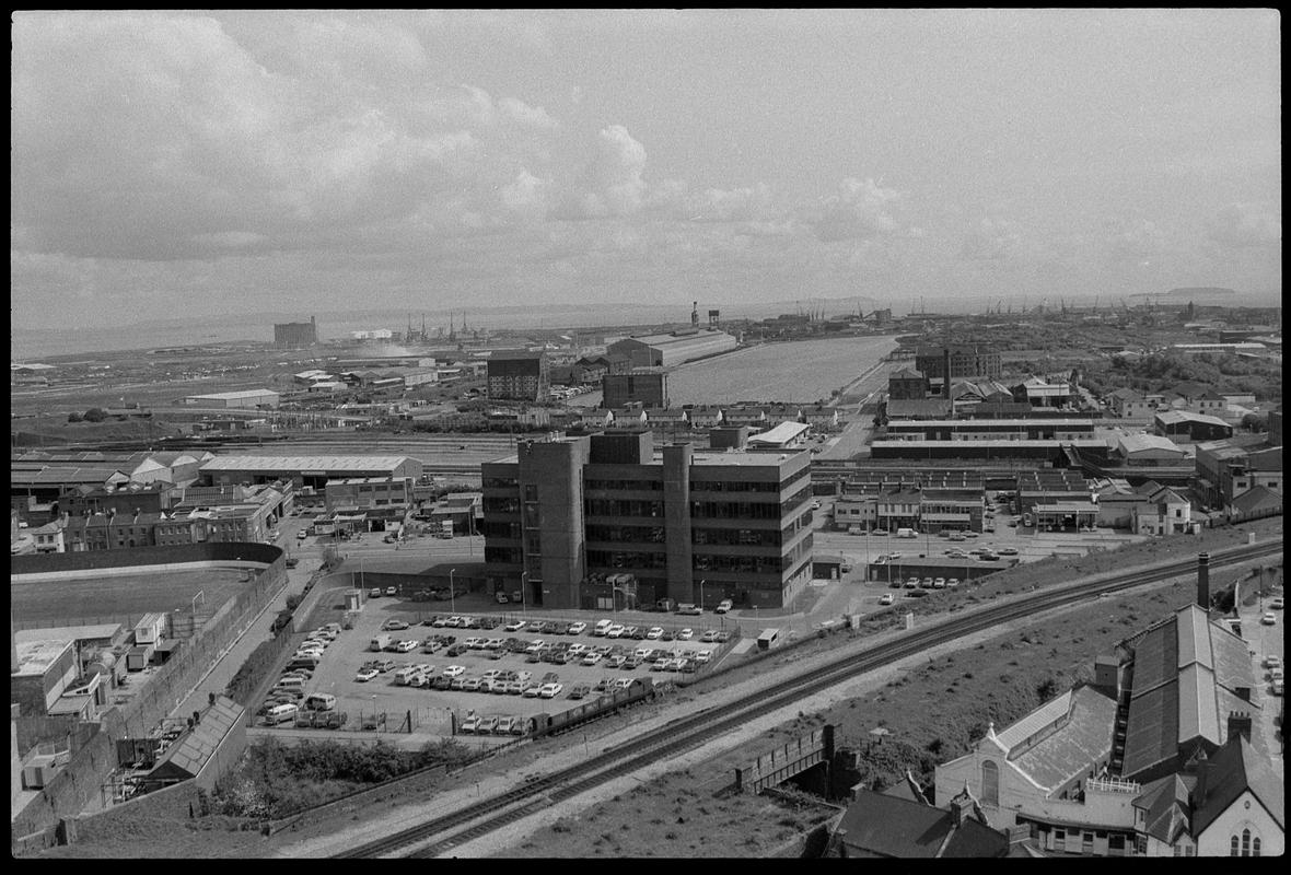 View from top of building on Churchill Way, looking south over railway line to Bute Road with Spillers building in background.