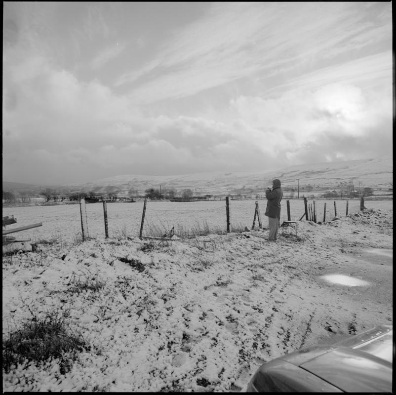 Black and white film negative showing a distant view of Blaenavon.
