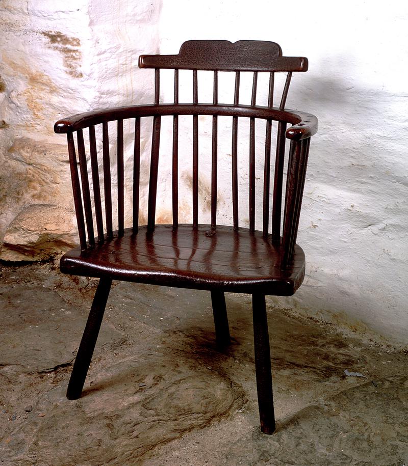 Three-legged 18th century armchair