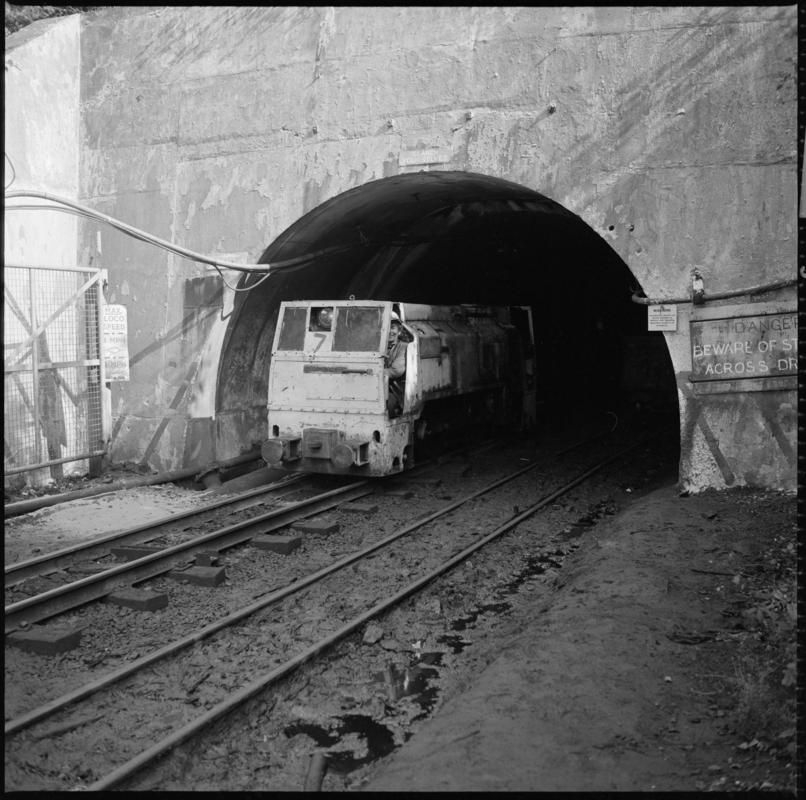 Black and white film negative showing an electric locomotive leaving the mine. 'Blaengwrach' is transcribed from original negative bag.  Similar to 2009.3/2443, 2009.3/2444 and 2009.3/2445.