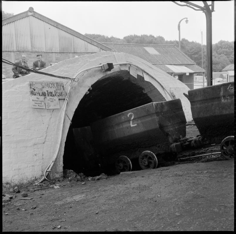 Black and white film negative showing drams being lowered into the slant, Ammanford Colliery 7 September 1976.  'Ammanford slant, 7 Sep 1976' is transcribed from original negative bag.