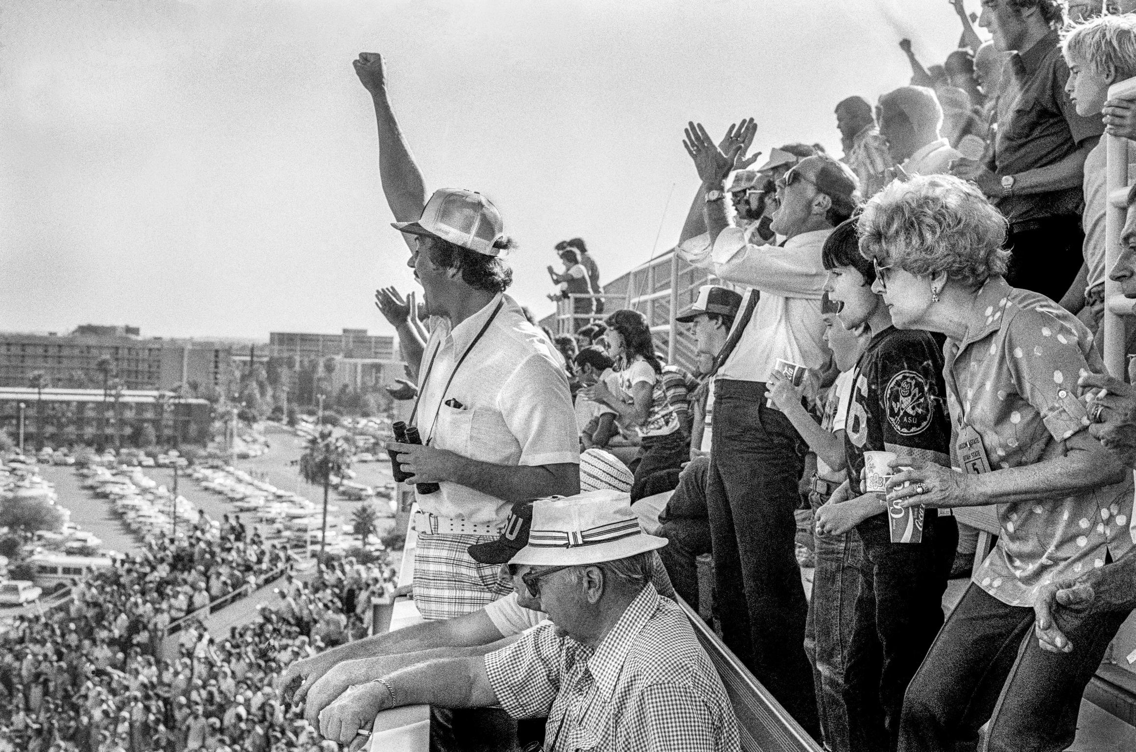 The enthusiastic supporters of the Arizona State University Football Team at a home game against Utah. Tempe, Arizona USA
