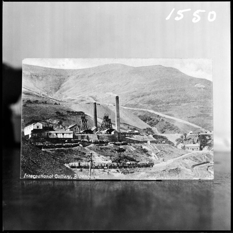 Black and white film negative of a postcard showing a general surface view of International Colliery, Blaengarw.  'International' is transcribed from original negative bag.