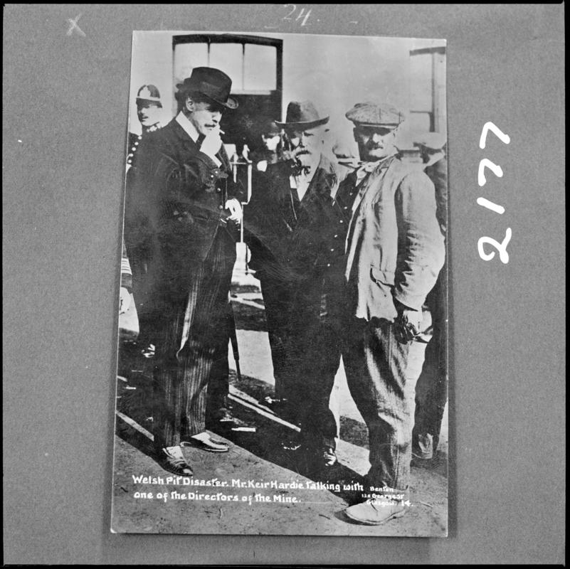 Black and white film negative of a photograph showing Keir Hardie talking to one of the Directors of the mine following the Universal Colliery disaster of 14 October 1913.  'Sen 1913' is transcribed from original negative bag.