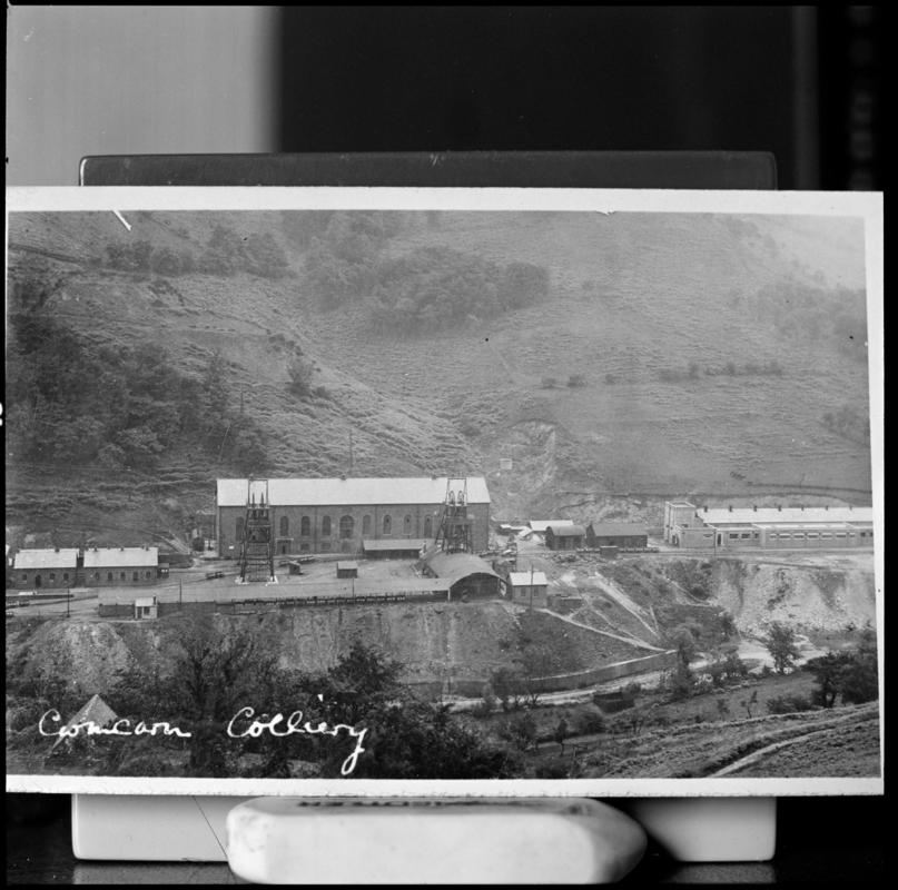 Black and white film negative of a photograph showing a surface view of Cwmcarn Colliery.  'Cwmcarn' is transcribed from original negative bag.  Appears to be identical to 2009.3/2504.
