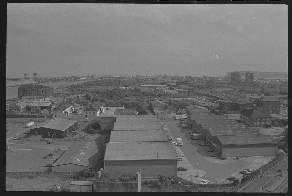 View to south east Butetown with Tyndall Street Industrial Area in foreground, with East Dock, Spillers Building, Loudoun Square Flats and Pier Head Building in background.