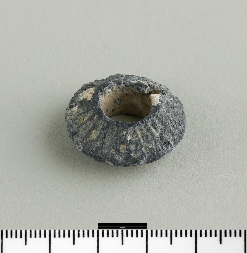 Early Medieval lead spindle whorl