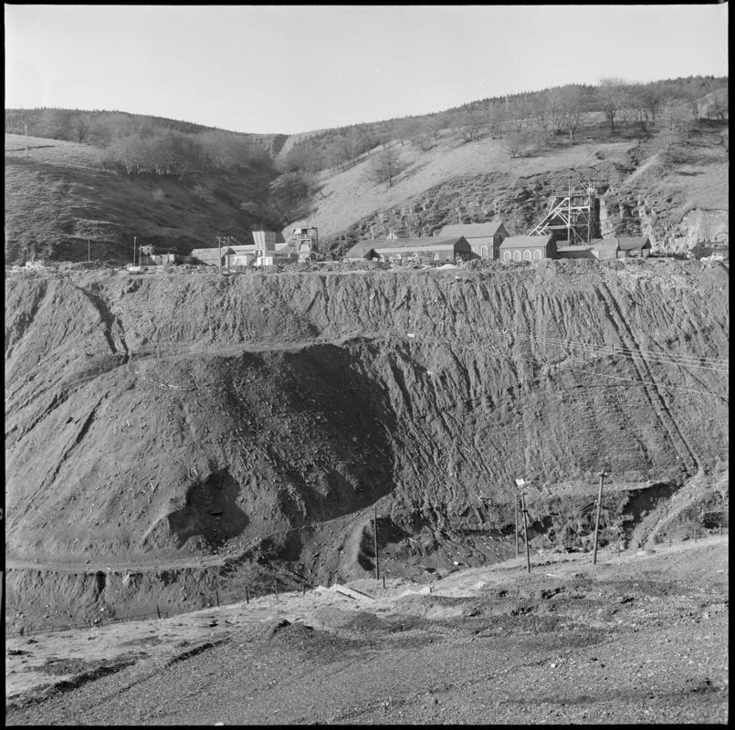 Black and white film negative showing a view towards Blaenserchan Colliery, 1978-9.  'Blaenserchan 1978-9' is transcribed from original negative bag.