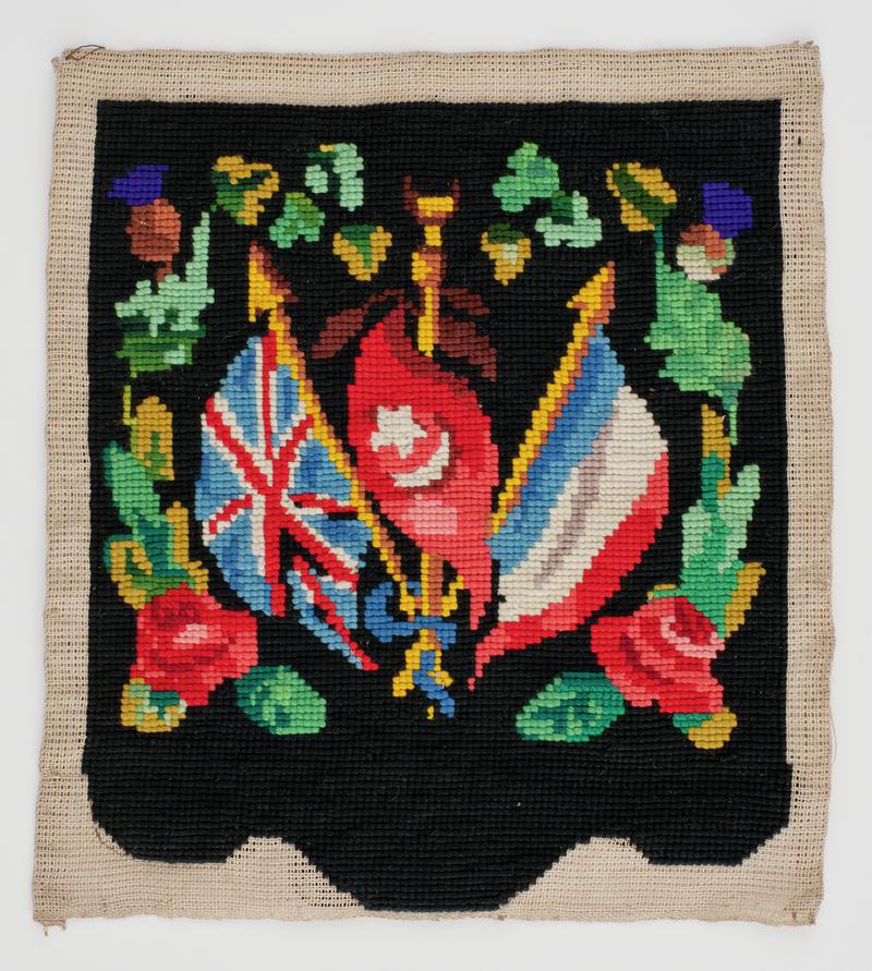 Woolwork picture embroidered with British, French & Turkish flags