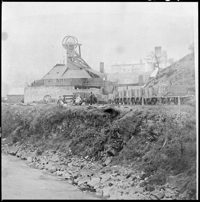 Black and white film negative of a photograph showing a general surface view of Cymmer Colliery, 1860.   'Cymmer' is transcribed from original negative bag.  Appears to be identical to 2009.3/1633.
