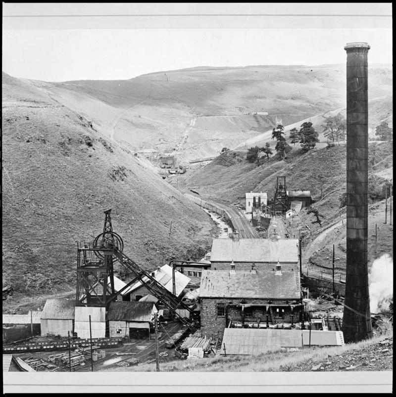 Black and white film negative showing a surface view of Glyncorrwg Colliery. 'Glyncorrwg' is transcribed from original negative bag.