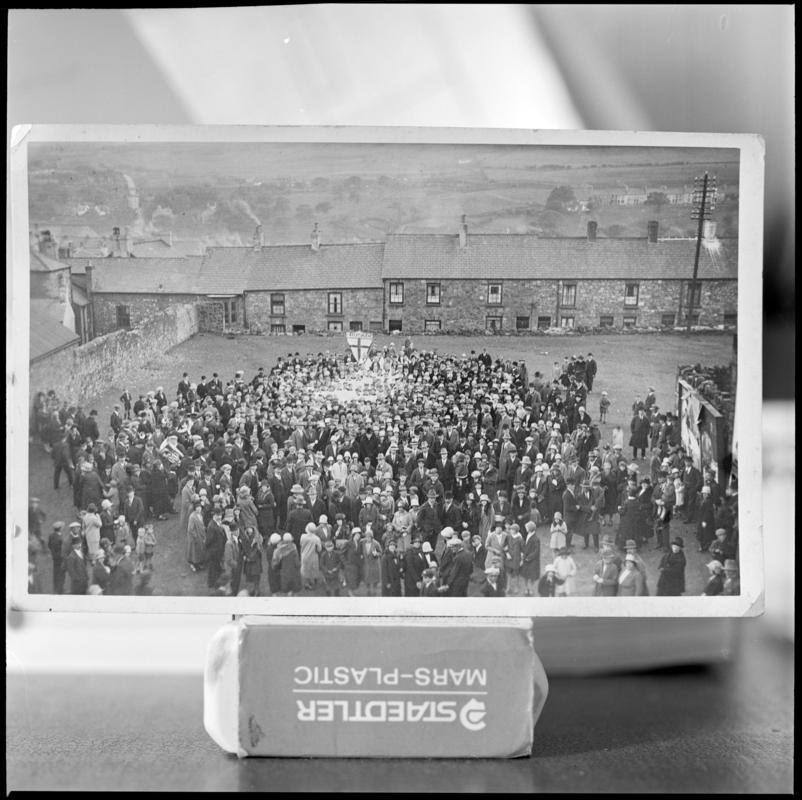 Black and white film negative of a photograph showing a large crowd of people, Blaenavon.  'Blaenavon' is transcribed from original negative bag.