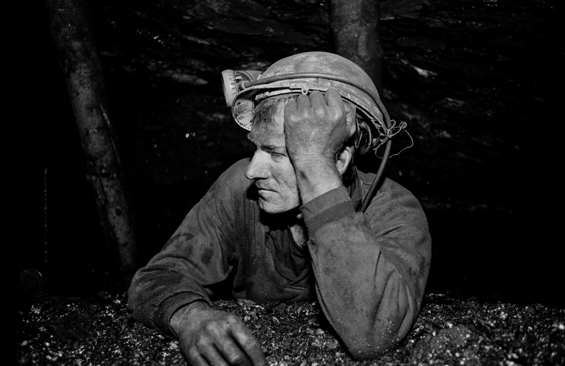 Black mountain coal. Miner underground, portrait. Neath Valley, Wales