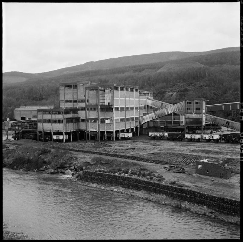 Black and white film negative showing a surface view of Aberpergwm Colliery, 1978.  'Aberpergwm 1978' is transcribed from original negative bag.