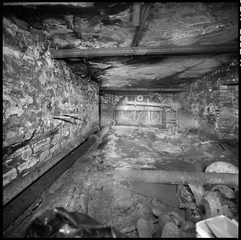 Black and white film negative showing the no. 3 landing, hetty shaft, Tymawr Colliery March 1980.  'No 3 landing hetty shaft, march 1980' is transcribed from original negative bag.