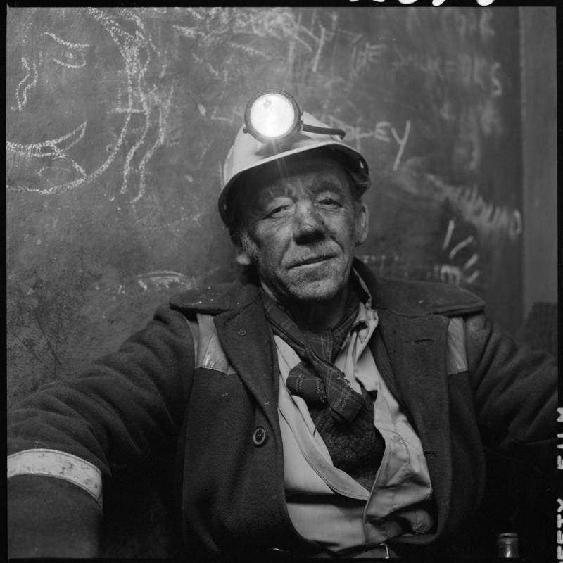 Black and white film negative showing a Coegnant Colliery miner.  'Coegnant' is transcribed from original negative bag.  Appears to be identical to 2009.3/2139.