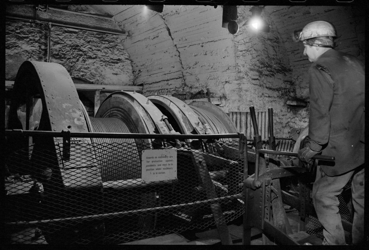 Haulage engine at Lewis Merthyr Colliery. Man to the right of the image.
