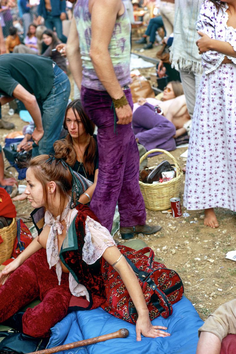 GB. ENGLAND. Isle of Wight Festival. Pop Festivals bring out the love and affection that is resting in us. It also brings out the wildest forms of dress sense. 1969.
