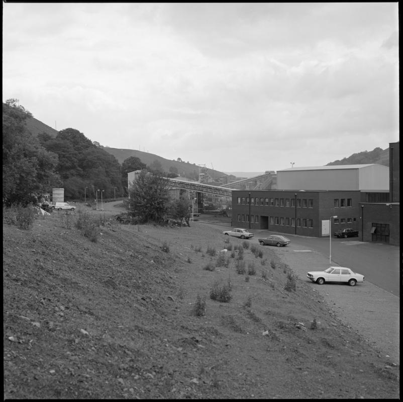 Black and white film negative showing Trelewis Mine offices with Taff Merthyr Colliery in the background.  'Trelewis' is transcribed from original negative bag.