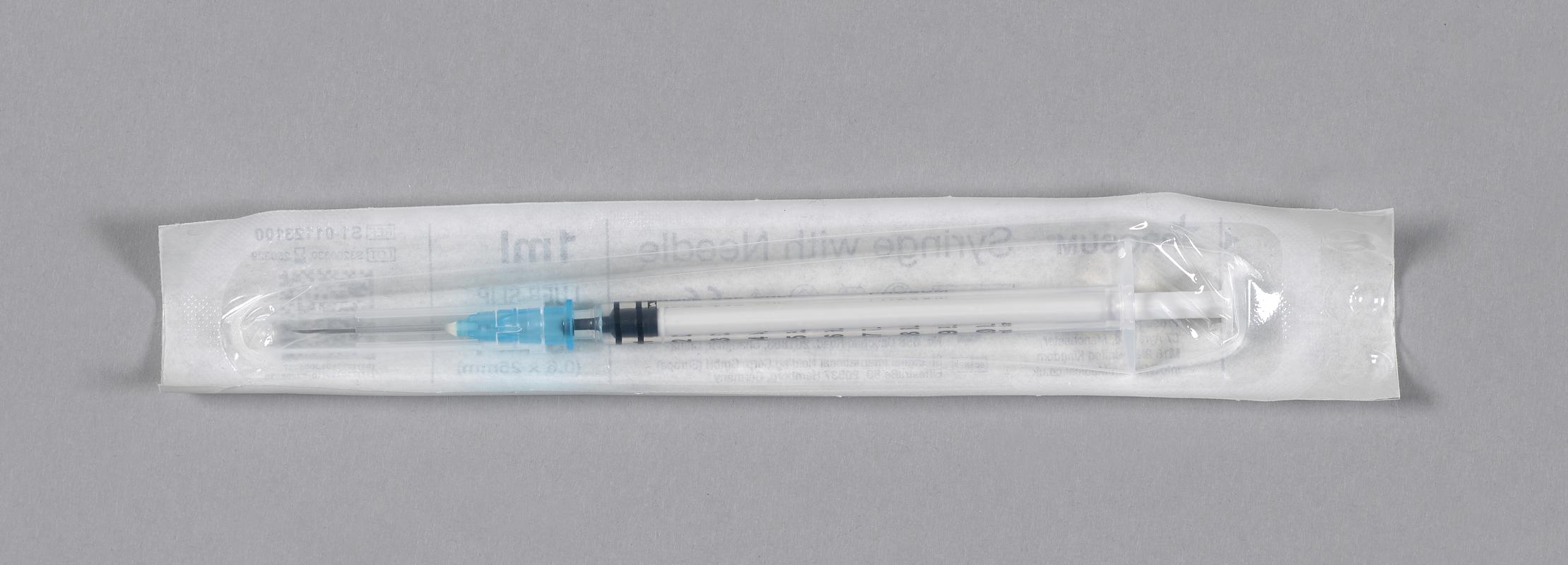 Unused syringe, in sterile packing.