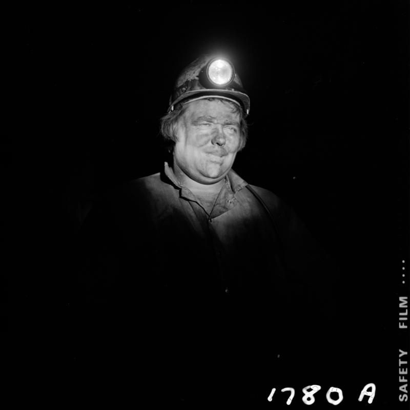 Black and white film negative showing a miner, Blaengwrach Mine, 1 November 1979.  'Blaengwrach 1 Nov 1979' is transcribed from original negative bag.  Appears to be identical to 2009.3/1342, 2009.3/1343, 2009.3/1345 and 2009.3/1346.