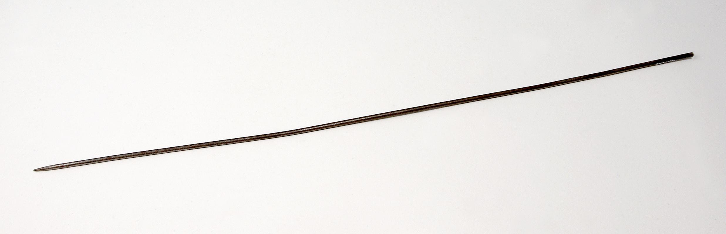 pointed steel wire (probably a core pin)