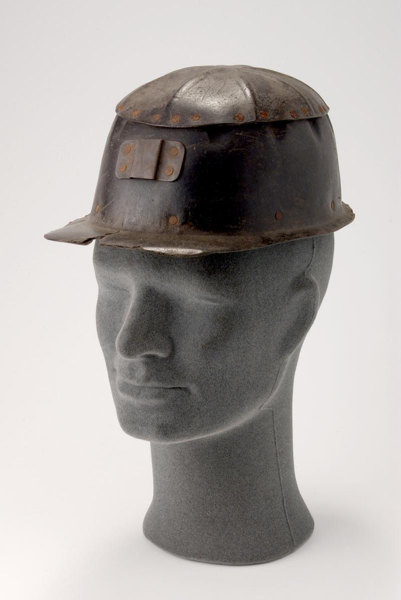 Miner's helmet (on head)