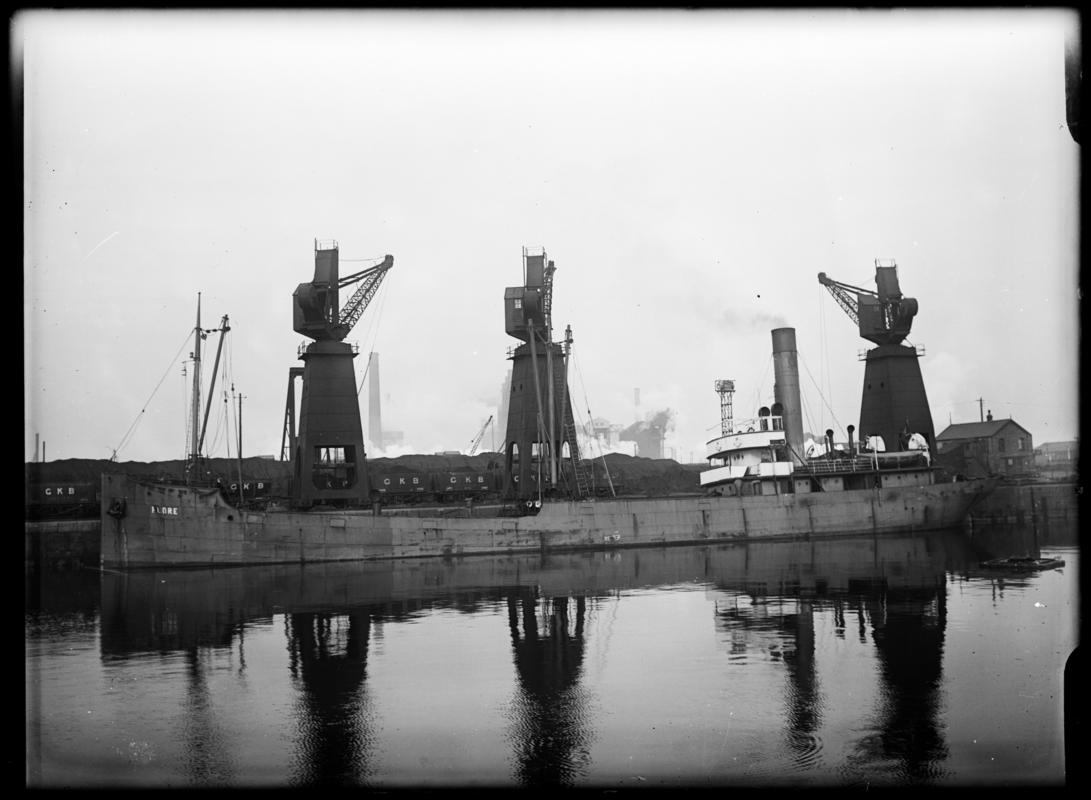 Port broadside view of S.S. FLORE at Cardiff Docks, c.1936.