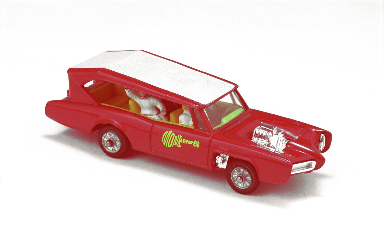 Monkees Monkeemobile manufactured by Mettoy Co. Ltd., Fforestfach. Brand name Corgi Toys.