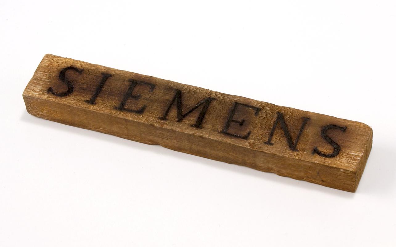 "SIEMENS" branding iron impression