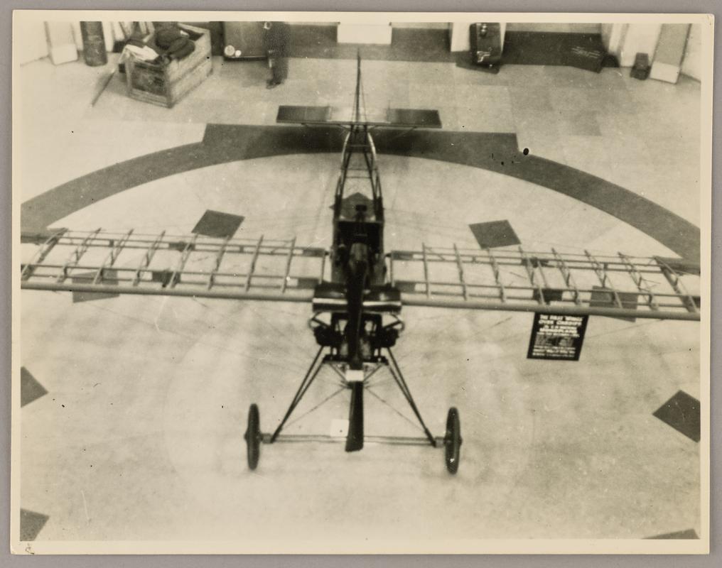 Photograph of Watkins monoplane in the main hall of the National Museum of Wales during the exhibition 'Wings for Victory', 1943.