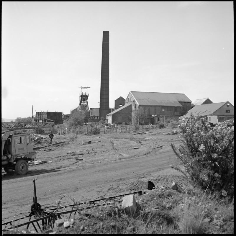 Black and white film negative showing a surface view of Morlais Colliery 13 May 1981.  'Morlais 13/5/81' is transcribed from original negative bag.
