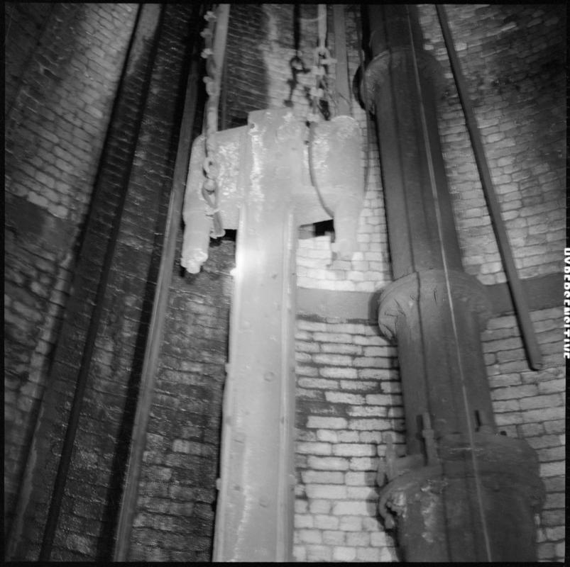 Black and white film negative showing the removal of the Hathorn Davey pump,  Marine Colliery.  'Marine' is transcribed from original negative bag.