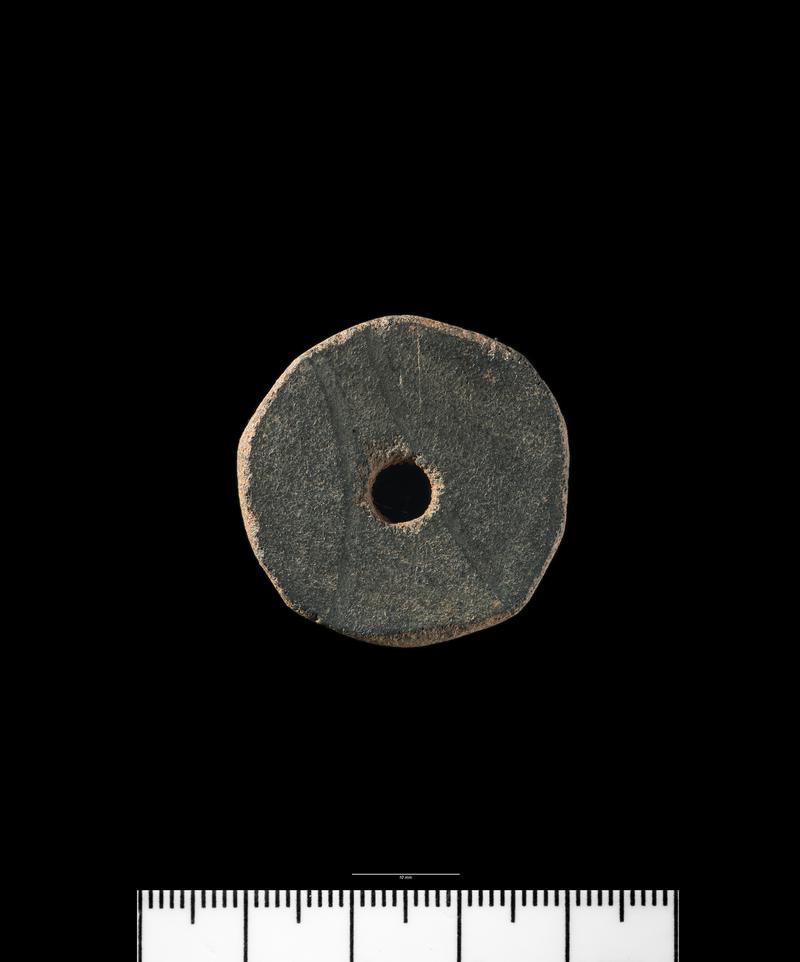 Roman pottery spindle whorl