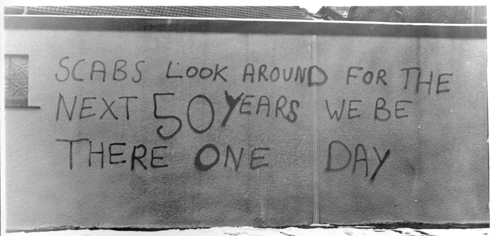 Anti - Scabs graffitti on the wall of a public toilet at Abercarn. 1984 - 1985