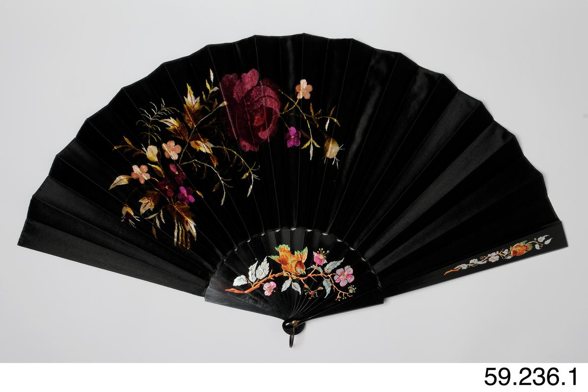 Black satin fan with coloured floral decoration