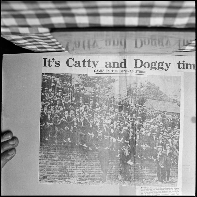 Black and white film negative showing a large group of miners, photographed from an article entitled 'Games in the General Strike'.