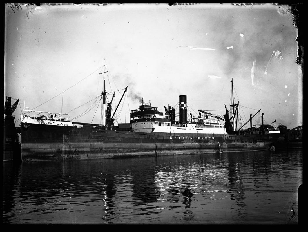 Port broadside view of S.S. NEWTON BEECH at Cardiff Docks, c.1936.