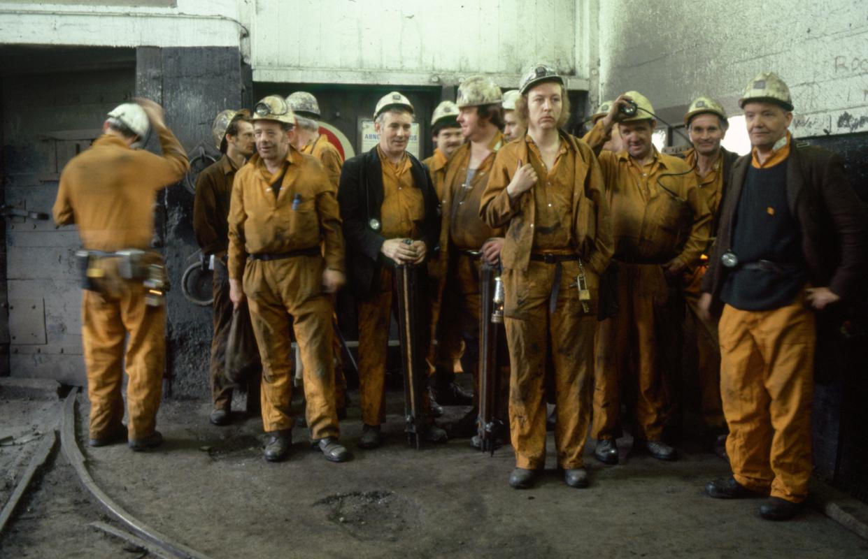 Colour film slide showing a group of miners, Oakdale Colliery 21 May 1981.