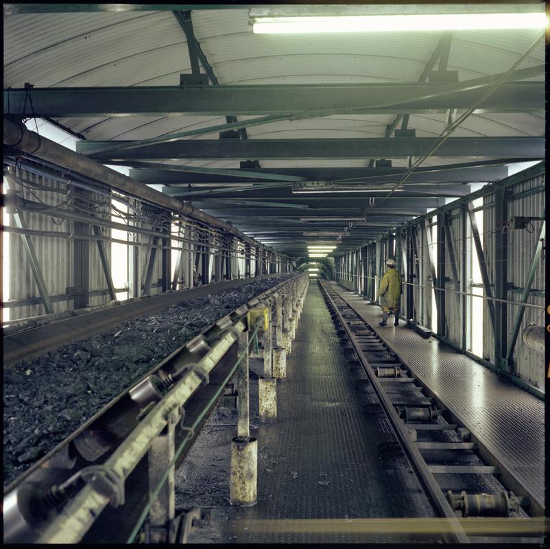 Colour film negative showing a high speed conveyor, underground at Blaenant Colliery.  'Blaenant' is transcribed from original negative bag.