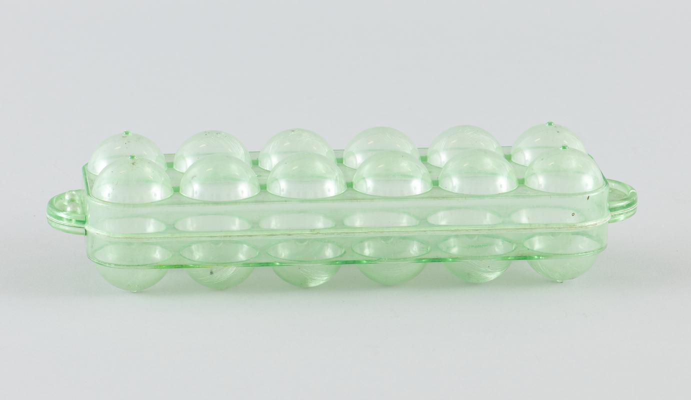 Clear with green tint plastic egg storage container for a dozen eggs, with detachable lid.
