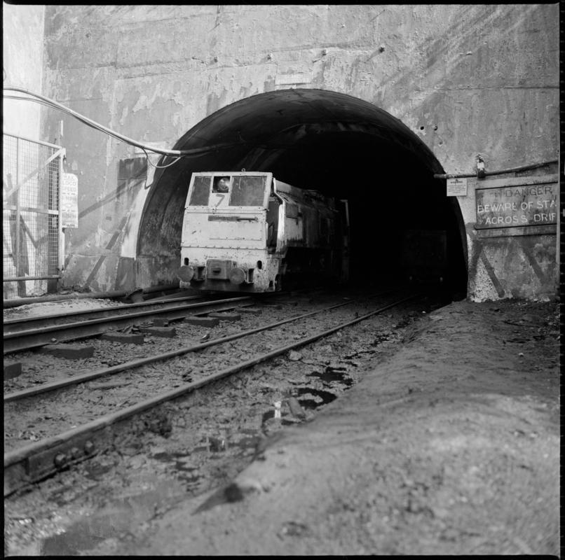 Black and white film negative showing an electric locomotive leaving the mine. 'Blaengwrach' is transcribed from original negative bag.  Similar to 2009.3/2442, 2009.3/2444 and 2009.3/2445.