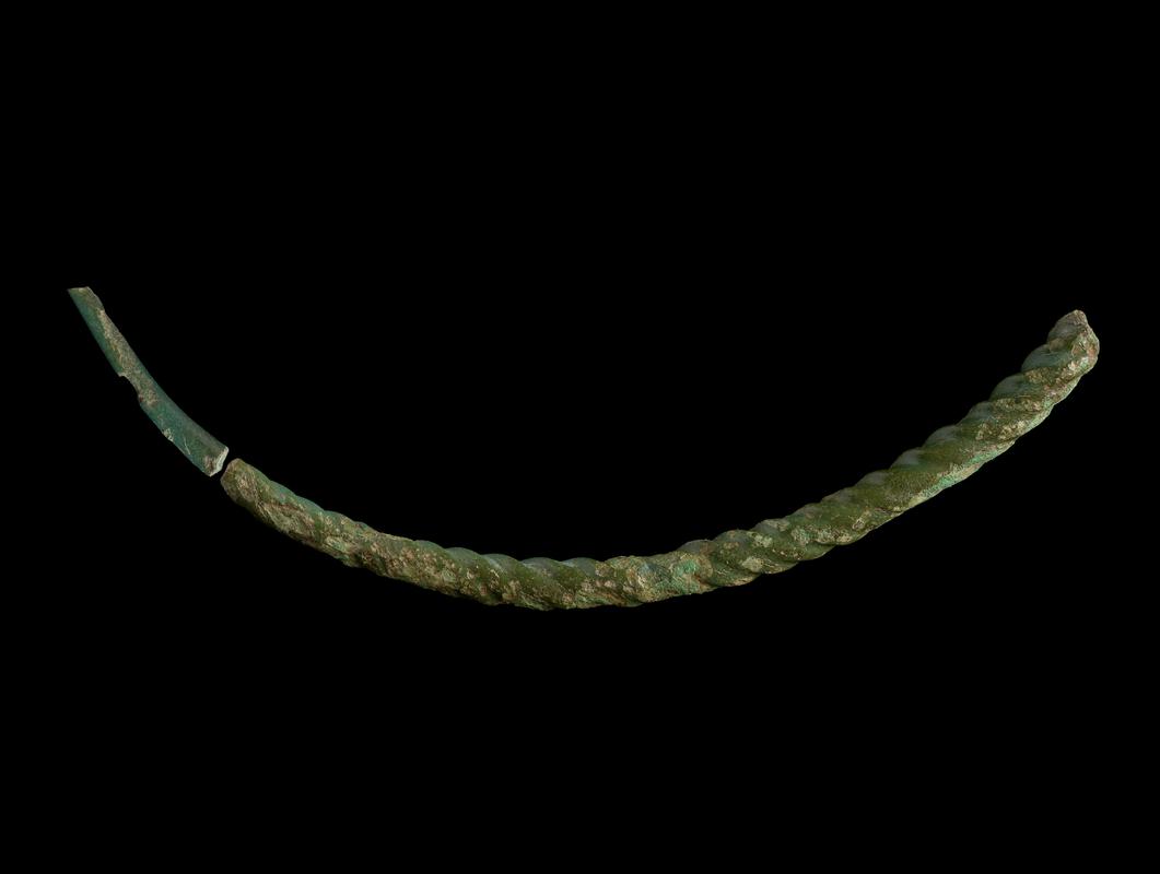 Two joining twisted bronze neck torc fragments